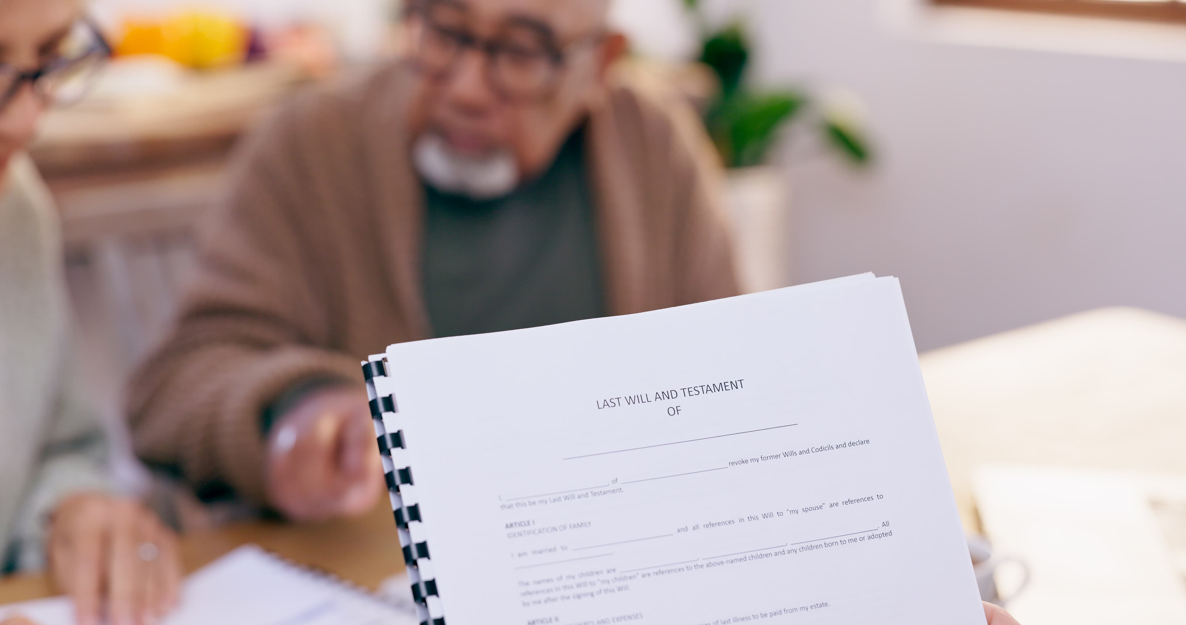 Family reviewing estate planning documents with a solicitor